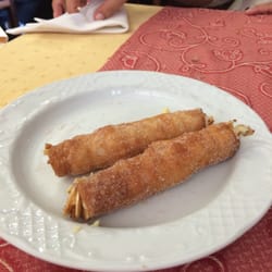Casa Pipeiro - Rulos fritos rellenos de crema ñam ñam
