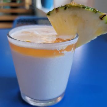 Boat Drinks - Pina Colada with Rum floater - Cocktail Bars Near Me - St. Augustine, Florida