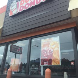  the front of a dunkin donuts store