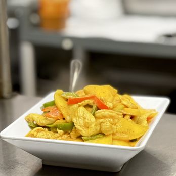 Bangkok Spice - Mango Curry - Shrimp & Chicken with fresh mango in yellow curry with zucchini, bell peppers and tomato - Thai Near Me - Shrub Oak, New York Bangkok Spice - Mango Curry - Shrimp & Chicken with fresh mango in yellow curry with zucchini, bell peppers and tomato - Thai Near Me - Shrub Oak, New York