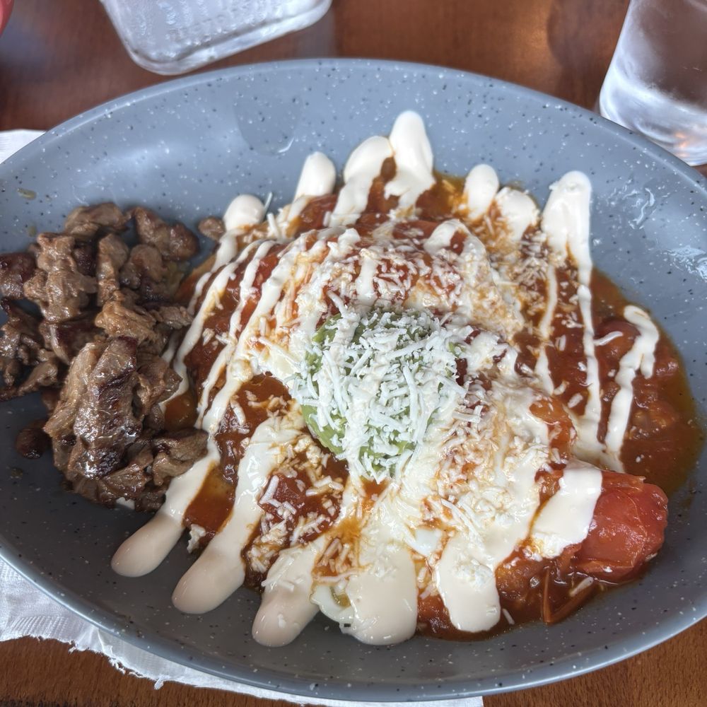 Guajiros Miami Eatery - Huevos rancheros with skirt steak - Coffee & Tea Near Me - Charlottesville, Virginia Guajiros Miami Eatery - Huevos rancheros with skirt steak - Coffee & Tea Near Me - Charlottesville, Virginia