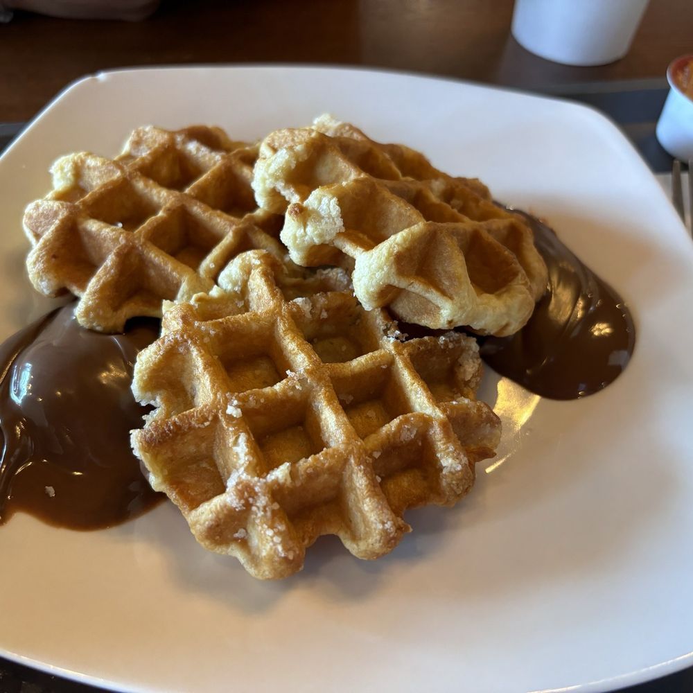 Moma’s Cafe - Sugar Waffles with Nutella - Cafes Near Me - Orlando, Florida Moma’s Cafe - Sugar Waffles with Nutella - Cafes Near Me - Orlando, Florida