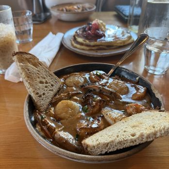 Bearcat Cafe - Hubby had shrimp and grits with succulent scallops, and crab claws...  oh the fruity pancakes with the vanilla whipped butter... m - Breakfast & Brunch Near Me - New Orleans, Louisiana