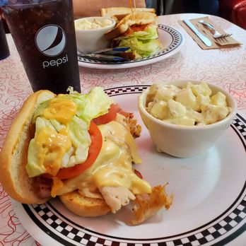 Charlie Parkers - Slim Kim w/potato salad and BLT in the background. - Diners Near Me - Springfield, Illinois Charlie Parkers - Slim Kim w/potato salad and BLT in the background. - Diners Near Me - Springfield, Illinois