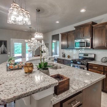 Authentic Custom Homes - a kitchen with granite countertops - General Contractors Near Me - Edmond, Oklahoma Authentic Custom Homes - a kitchen with granite countertops - General Contractors Near Me - Edmond, Oklahoma