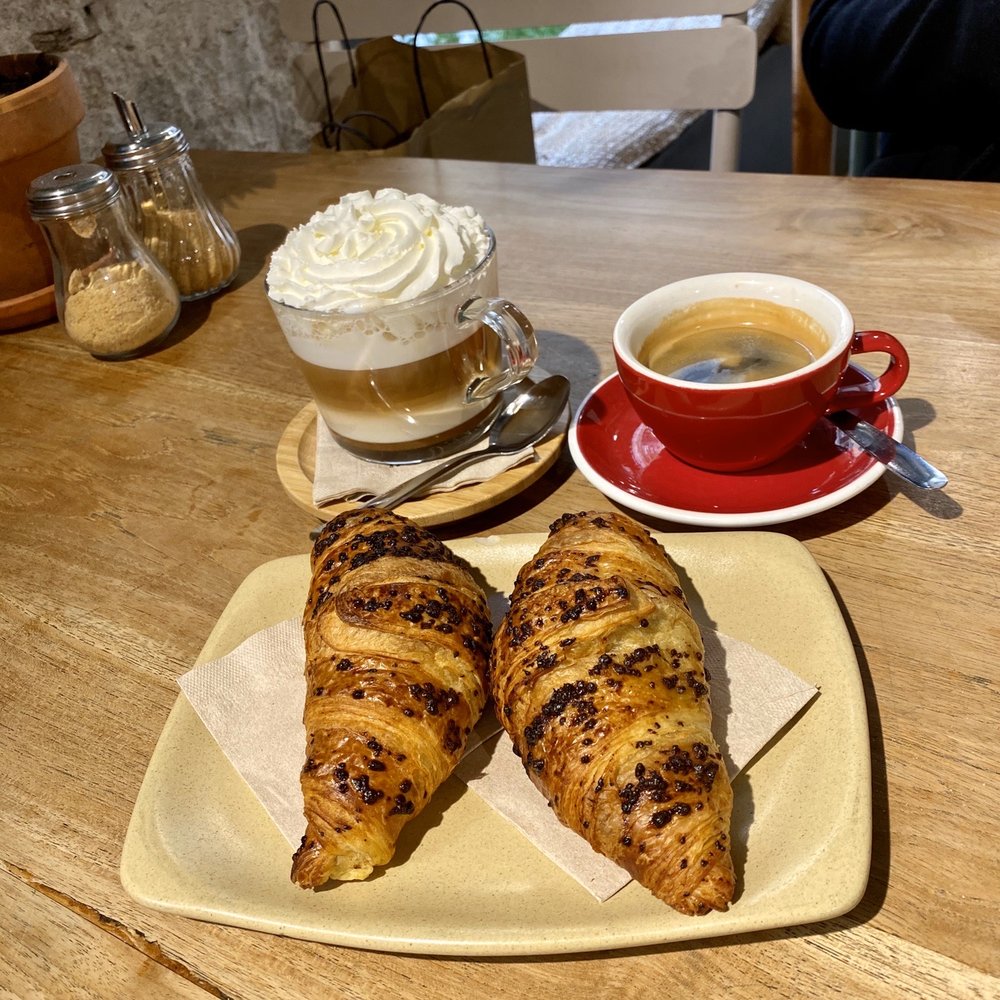 Xholate croissant, caramel cappuccino, and double espresso