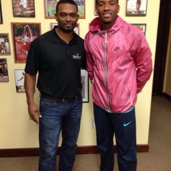 Getwell Chiropractic - Dr. Henderson with Demetrius Pender, Olympic Gold Medalist from Bahamas.
