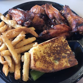 Moe's Original Bar B Que - Smoked wings with fries and a slice of cornbread. Banana pudding not shown. - Barbeque Near Me - Trussville, Alabama Moe's Original Bar B Que - Smoked wings with fries and a slice of cornbread. Banana pudding not shown. - Barbeque Near Me - Trussville, Alabama