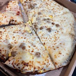 Casey's - Both pizzas had so much cheese and undercooked. Breakfast wasn't really a "Breakfast" pizza. $38 to just put in the trash!