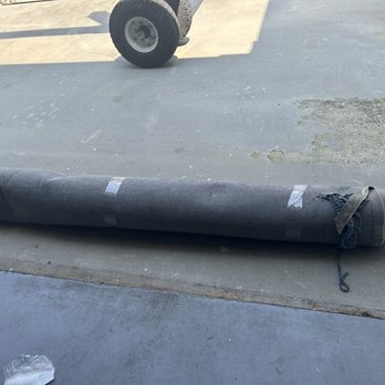 PODS Moving & Storage - Torn rug - Self Storage Near Me - Rocky Point, North Carolina