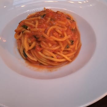 Scarpetta - Their famous spaghetti with tomato basil sauce - Italian Near Me - New York, New York Scarpetta - Their famous spaghetti with tomato basil sauce - Italian Near Me - New York, New York