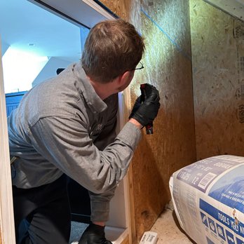 Northwest Exterminating - a man using a drill to fix a hole in the wall - Pest Control Near Me - Marietta, Georgia Northwest Exterminating - a man using a drill to fix a hole in the wall - Pest Control Near Me - Marietta, Georgia