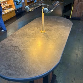 Zeitgeist Coffee - Super cool table with vintage light fixtures - Coffee & Tea Near Me - Seattle, Washington