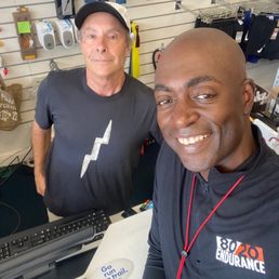 Owner Chris and shoe/running expert with me Coach Owner Chris and shoe/running expert with me Coach