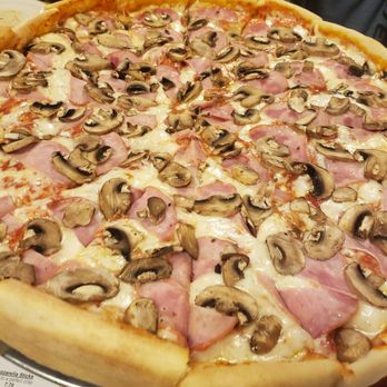 Michelangelo's Pizzeria - Chicago style Canadian bacon and fresh mushroom - Pizza Near Me - Clovis, California Michelangelo's Pizzeria - Chicago style Canadian bacon and fresh mushroom - Pizza Near Me - Clovis, California