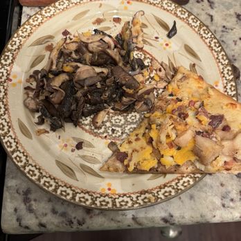 Lilly's Pizza - Mushrooms removed from two slices of pizza. One of the dissected slices of pizza next to it for size reference. - Pizza Near Me - Raleigh, North Carolina Lilly's Pizza - Mushrooms removed from two slices of pizza. One of the dissected slices of pizza next to it for size reference. - Pizza Near Me - Raleigh, North Carolina