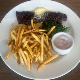 Chefs featured steak with fries, Aioli dip and spinach Chefs featured steak with fries, Aioli dip and spinach