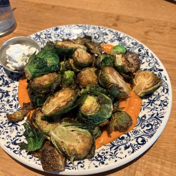 Tupelo Honey - Crispy Brussel Sprouts cooked to perfection bursting with flavor reminding me of the first experience from yesterday. - Southern Near Me - Columbia, South Carolina Tupelo Honey - Crispy Brussel Sprouts cooked to perfection bursting with flavor reminding me of the first experience from yesterday. - Southern Near Me - Columbia, South Carolina