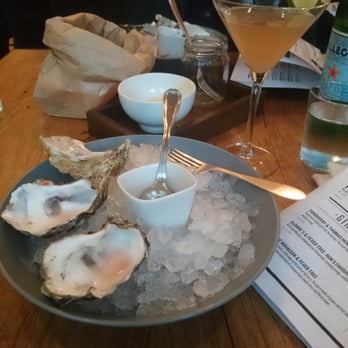 Ron Gastrobar - What's left of the oysters and a rhubarb Amsterdam cocktail! - French Near Me - Amsterdam, New Hampshire Ron Gastrobar - What's left of the oysters and a rhubarb Amsterdam cocktail! - French Near Me - Amsterdam, New Hampshire