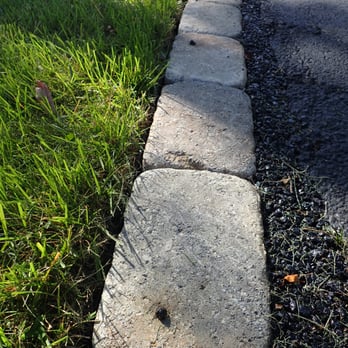 Lawn Rangers - You can't see the 6" deep vinyl buried to the left of the pavers. - Tree Services Near Me - Lutherville, Maryland