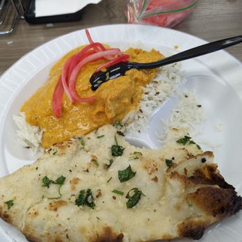 Swaad Stop - Chicken Tikka masala with rice, marinated onions, and garlic naan - Indian Near Me - Holbrook, Arizona