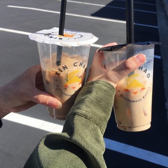 Xin Chao Eatery - LEFT: Iced Vietnamese Coffee (Ca Phe Sua Da). - too light & too sweet. RIGHT: Iced Milk Tea with Boba. - order at own risk (: - Vietnamese Near Me - San Diego, California Xin Chao Eatery - LEFT: Iced Vietnamese Coffee (Ca Phe Sua Da). - too light & too sweet. RIGHT: Iced Milk Tea with Boba. - order at own risk (: - Vietnamese Near Me - San Diego, California