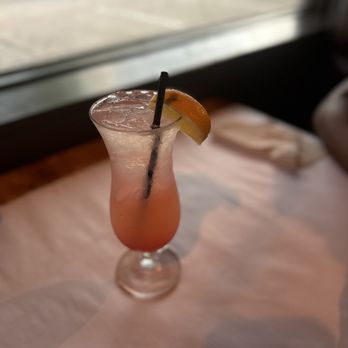 Red Crab Juicy Seafood - a glass with a drink on a table - Seafood Near Me - Arlington, Texas