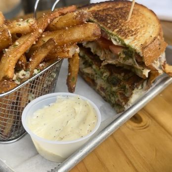 RAPPOURT - Pesto & tomato grilled cheese (with grilled chicken) and truffle fries with aioli - Bars Near Me - Ann Arbor, Michigan