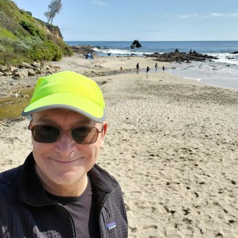 Corona Del Mar State Beach - Guy hanging out on the beach on a 60 degree day. - Beaches Near Me - Corona Del Mar, California Corona Del Mar State Beach - Guy hanging out on the beach on a 60 degree day. - Beaches Near Me - Corona Del Mar, California