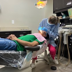 Rewards Dental of Kent - My husband getting her teeth's clean