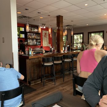 Jeffrey Adams on Fourth - a man sitting at a table in a restaurant - Steakhouses Near Me - Winston-Salem, North Carolina Jeffrey Adams on Fourth - a man sitting at a table in a restaurant - Steakhouses Near Me - Winston-Salem, North Carolina