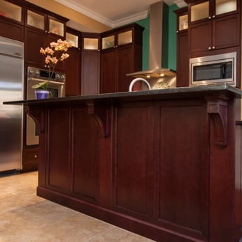 Donchris Designs - a kitchen with a center island - General Contractors Near Me Donchris Designs - a kitchen with a center island - General Contractors Near Me