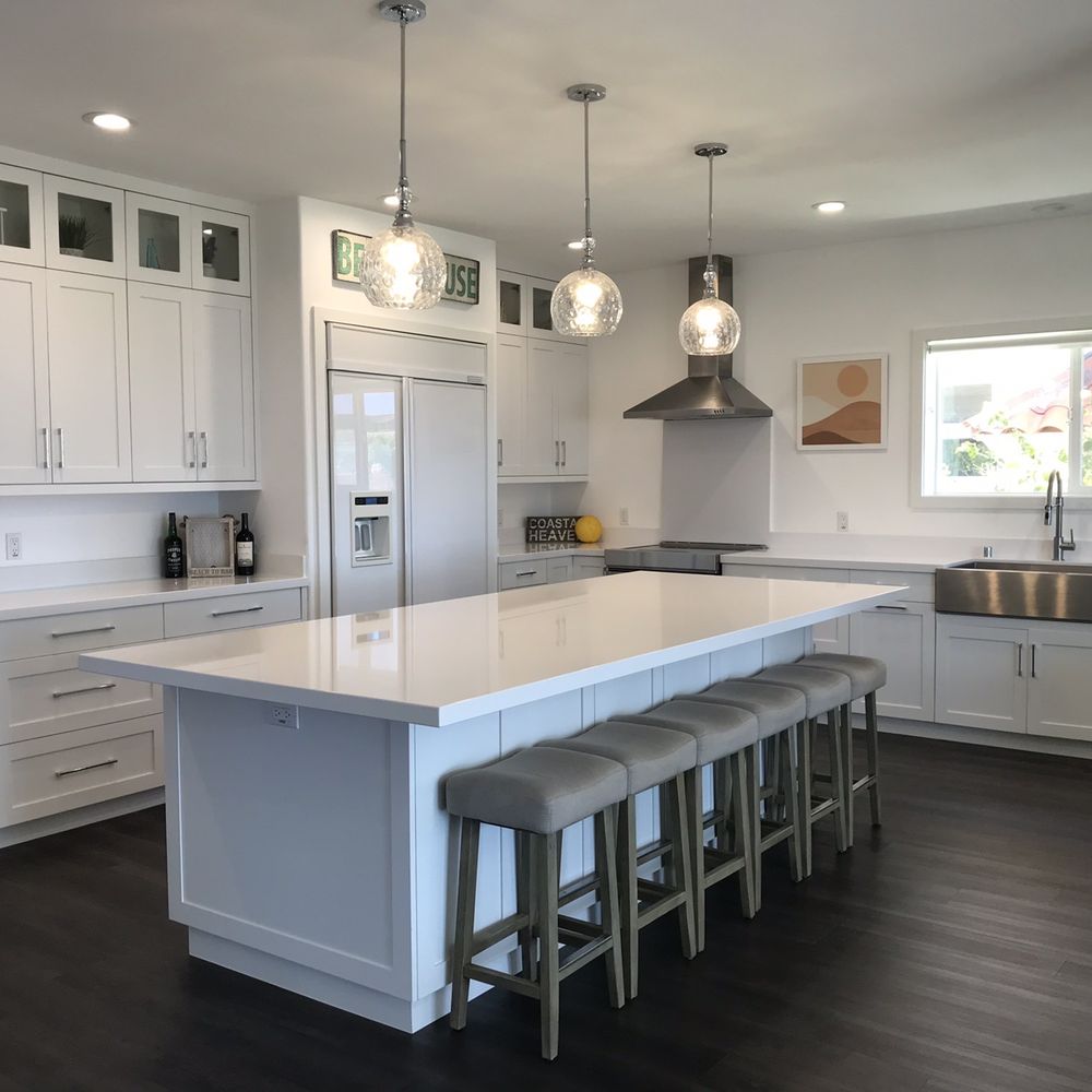 Versatile Construction - a kitchen with a center island - General Contractors Near Me Versatile Construction - a kitchen with a center island - General Contractors Near Me