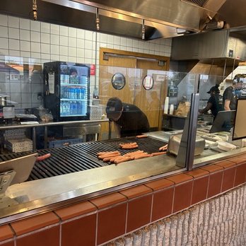 Ted's Hot Dogs - Watch the cooks grill your food to order. - Hot Dogs Near Me - Amherst, New York