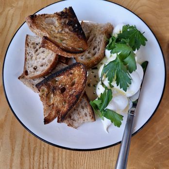 Carnegie Cellars Wine Bar and Kitchen - Flour City Bread with cardamom honey and whipped feta. - New American Near Me - Rochester, New York
