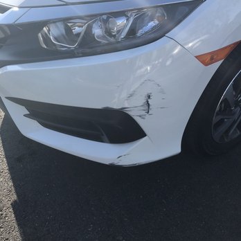 Long Beach Collision Center - Pre-LBCC. We fought the side of the garage, and the garage definitely won. - Body Shops Near Me - Long Beach, California