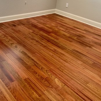 Capital Valley Floors - Refinished, smooth wood floor with natural stain. - Flooring Near Me