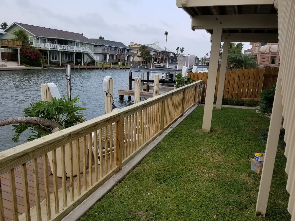 Slide of Pride of Texas Roof and Fence