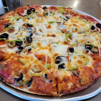 Casa Pizza Restaurant - This is the House Special. Medium is 8 slices. So good! - Italian Near Me - El Paso, Texas