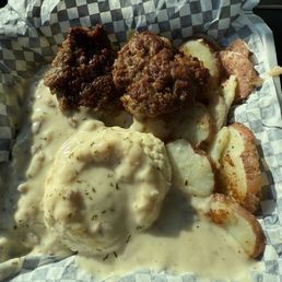 Buscuits and gravy, side of homeade sausage.