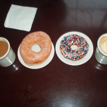 Top Pot Doughnuts - Cafe Americano, cinnamon sugar donut, cake donut with sprinkles, and soy latte. - Bakeries Near Me - Seattle, Washington