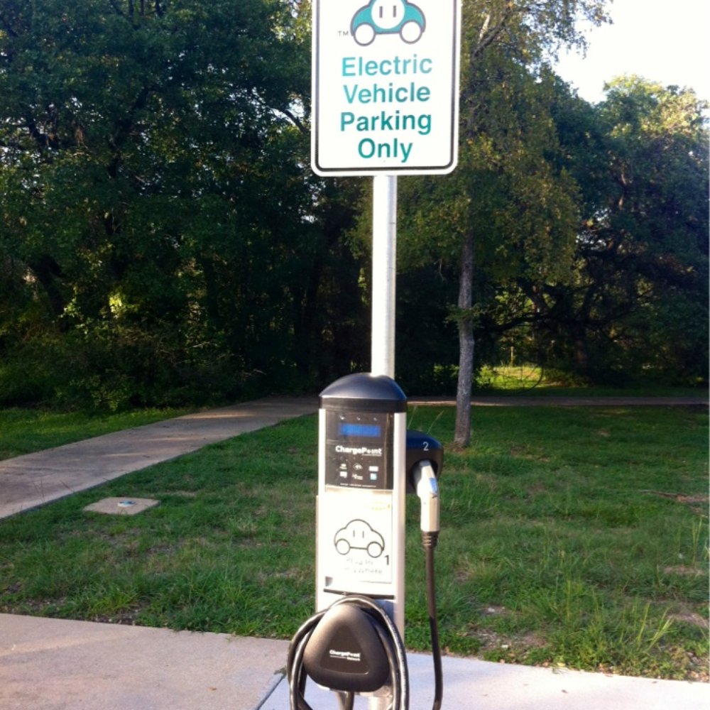 Electric vehicle charging pumps are here at the library. Interesting!