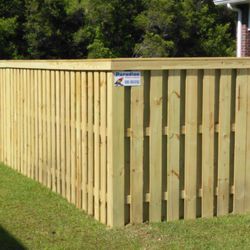 Paradise Fencing - 6' capped shadow box style privacy fence.