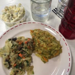 Mushroom pasta, cooked cabbage and potato salad.
