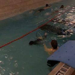 Swimming Stages Swim Academy - Son swimming through hoop!