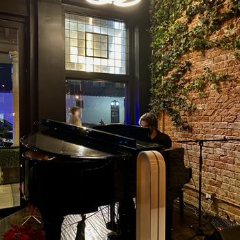 Elliott's Steakhouse - Beautiful tunes being played on the piano - Steakhouses Near Me - Chandler, Arizona Elliott's Steakhouse - Beautiful tunes being played on the piano - Steakhouses Near Me - Chandler, Arizona