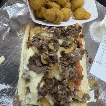Ishkabibble's - Philly Cheesesteak with onions, mushrooms and extra cheese.  Fried Mushrooms - American Near Me - Philadelphia, Pennsylvania
