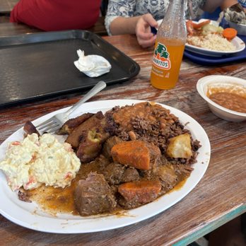 Mofongo Cafe - This is an order from the buffet with seasoned beef, brown rice, pinto beans, potato salad, and fried plantains - Dominican Near Me - Nashville, Tennessee Mofongo Cafe - This is an order from the buffet with seasoned beef, brown rice, pinto beans, potato salad, and fried plantains - Dominican Near Me - Nashville, Tennessee