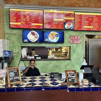 Tortas Mexico - The owner in his element. Zoom in to see the menu. - Mexican Near Me - Pasadena, California