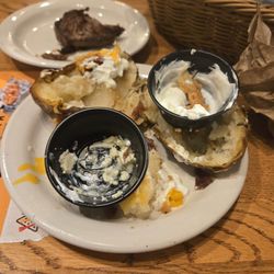Dry over cooked baked potato and no butter!
